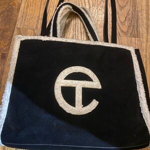 telfar sherpa and suede black and cream tote bag